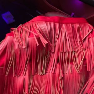 Red fringe leather skirt with zipper back. Size m. Perfect for summer or rodeo!